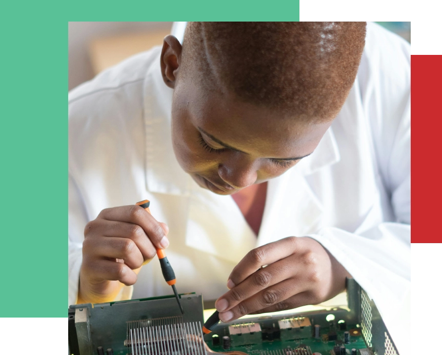 A man working on an electronic device.